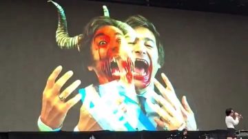 La banda que proyectó un video caricaturizando a Milei como un diablo hizo una aclaración