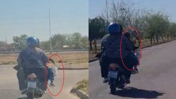 Imprudencia al volante: Una mujer trasladaba a una niña colgando en moto por las calles de Santiago