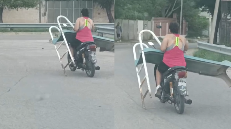 Imprudencia total: una mujer en moto y sin casco cargó un tobogán y circuló por avenida Lugones